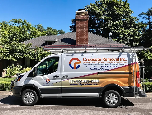 Ledyard Chimney Sweep technician removing creosote safely in Ledyard, CT